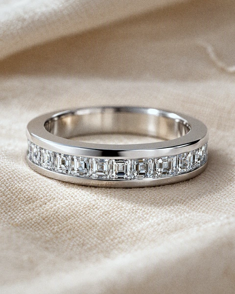 The Square Eternity Ring on pale ivory silk