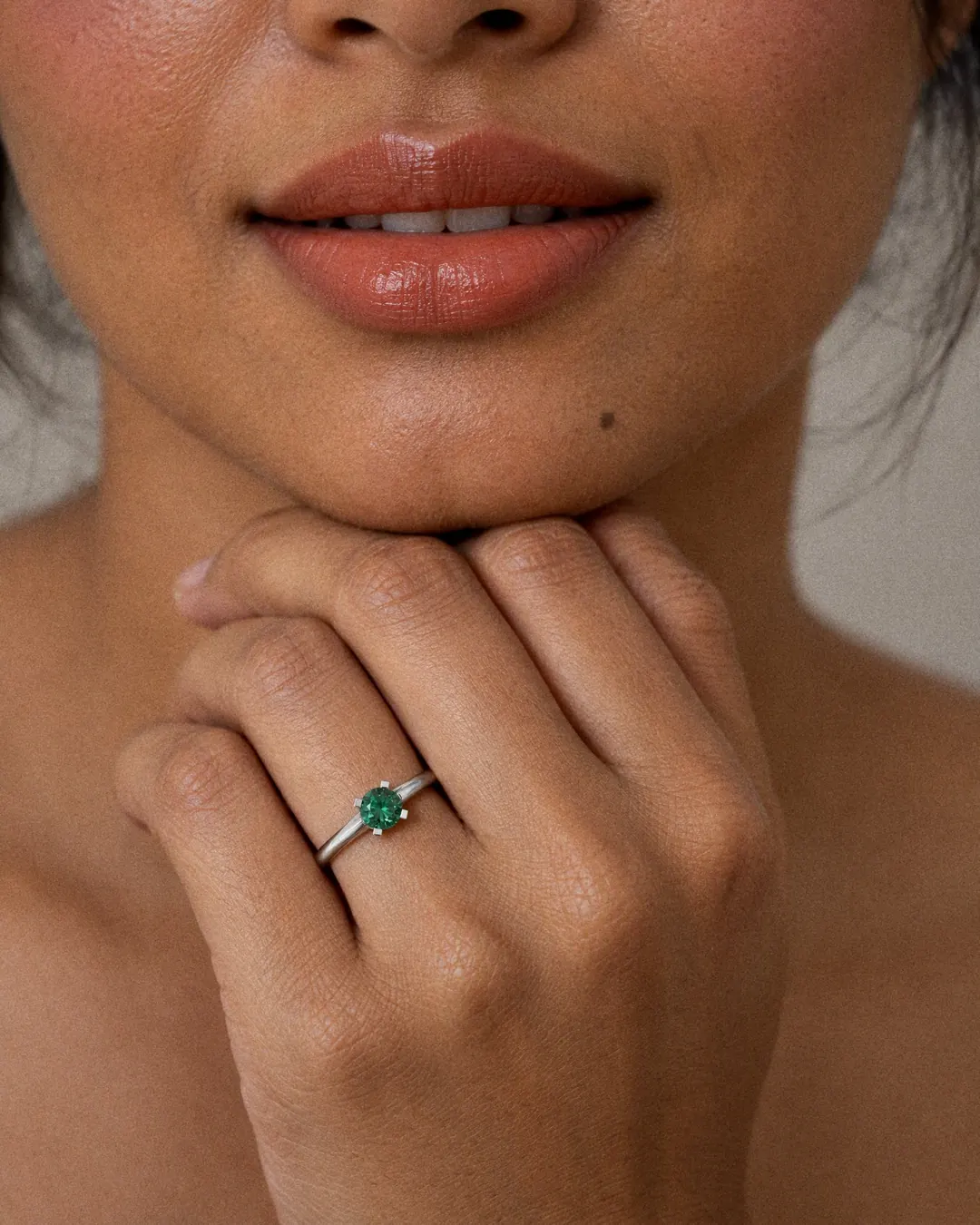 Classic Solitaire Ring, green stone, rhodium finish, worn