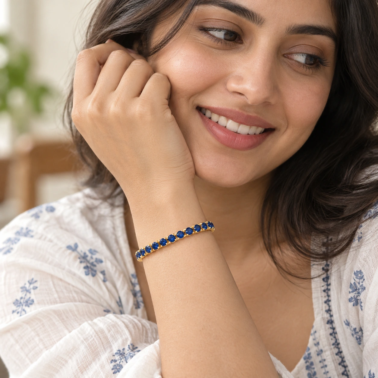 Classic Tennis Bracelet, blue stone, gold finish — worn close