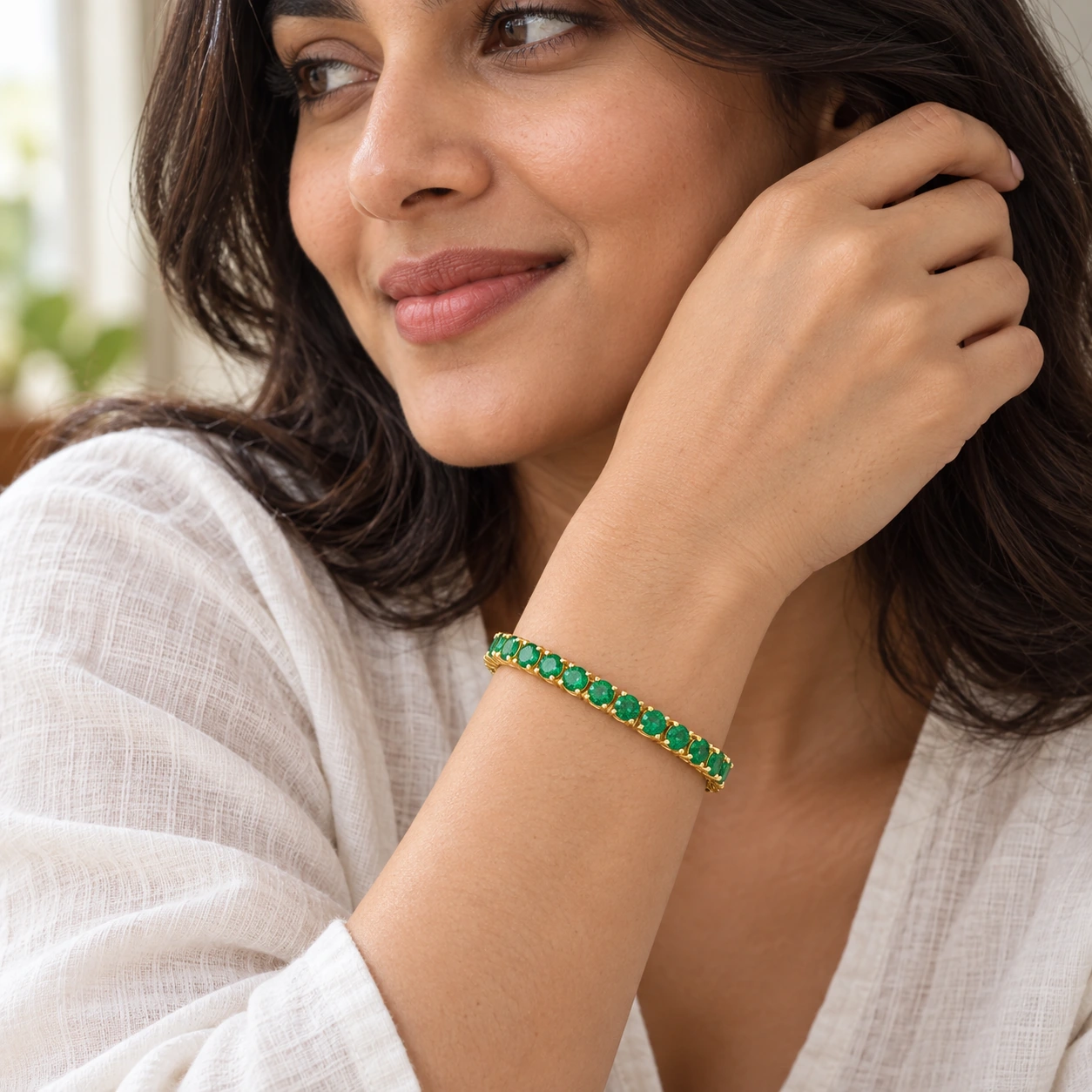 Classic Tennis Bracelet, green stone, gold finish — worn close