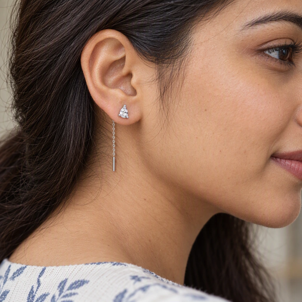 Petite Pear Sui Dhaga Earrings, white stone, rhodium finish — worn